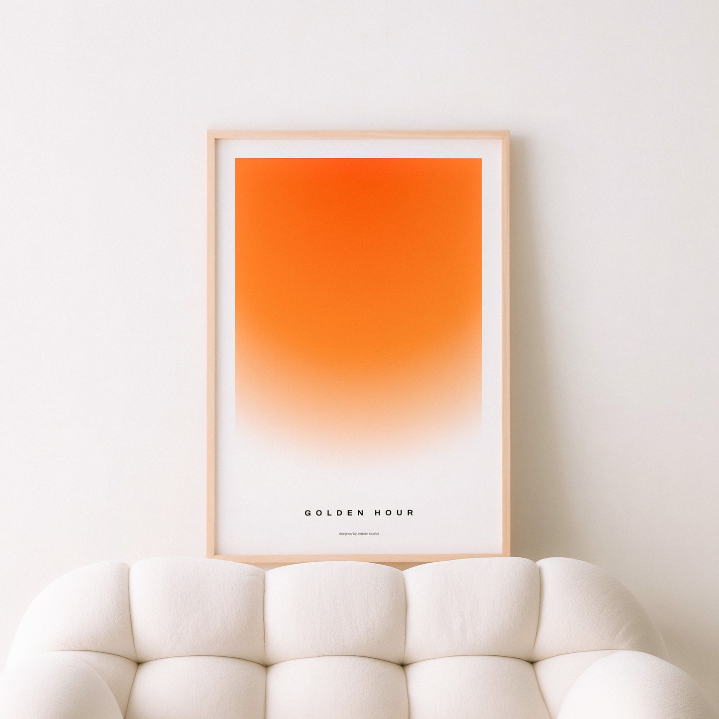 Minimal poster art home decor with text "GOLDEN HOUR" alongside a warm gradient portraying a sunset in a midcentury modern / retro design.